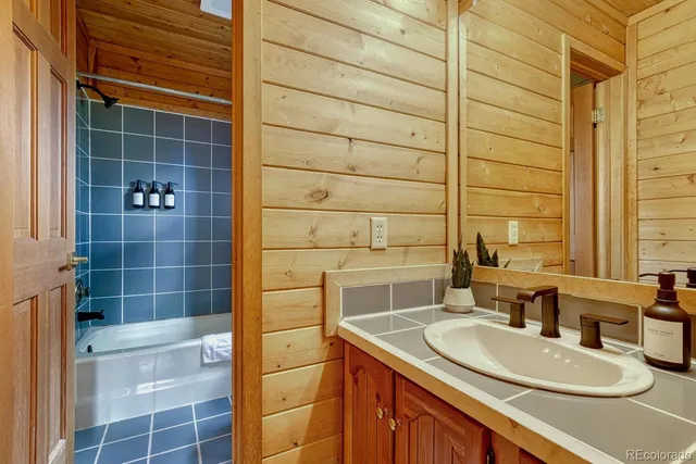 a bed room with a bed and a window