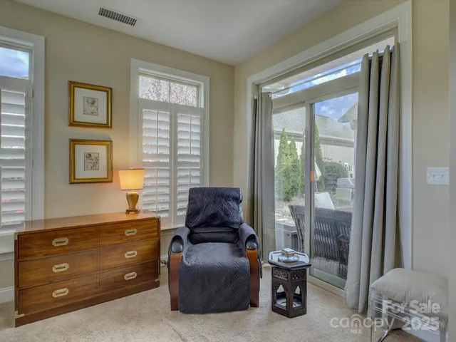 a room with furniture and a window