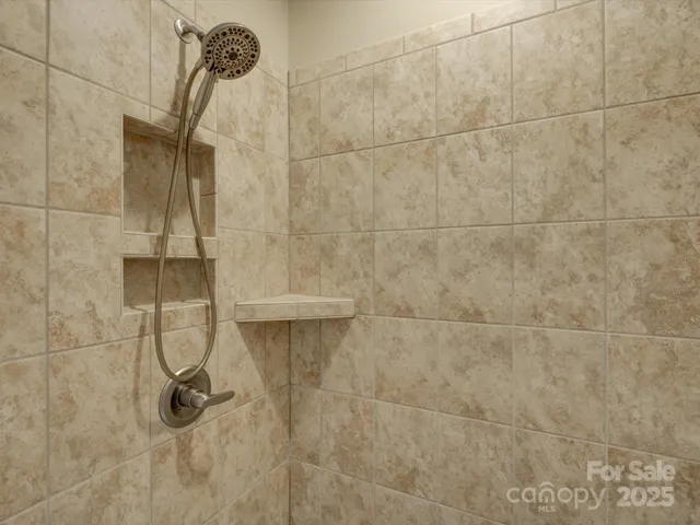 a view of the patio with couches chairs and potted plants