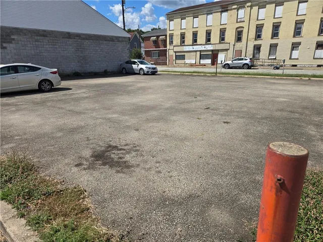 a view of car parked in front of building