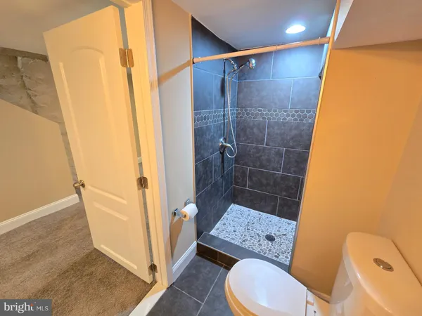 a utility room with a sink a washer and dryer