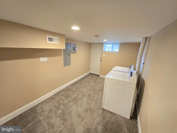 a view of balcony with wooden floor