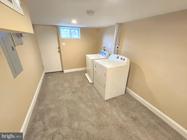 a front view of a building and outdoor space