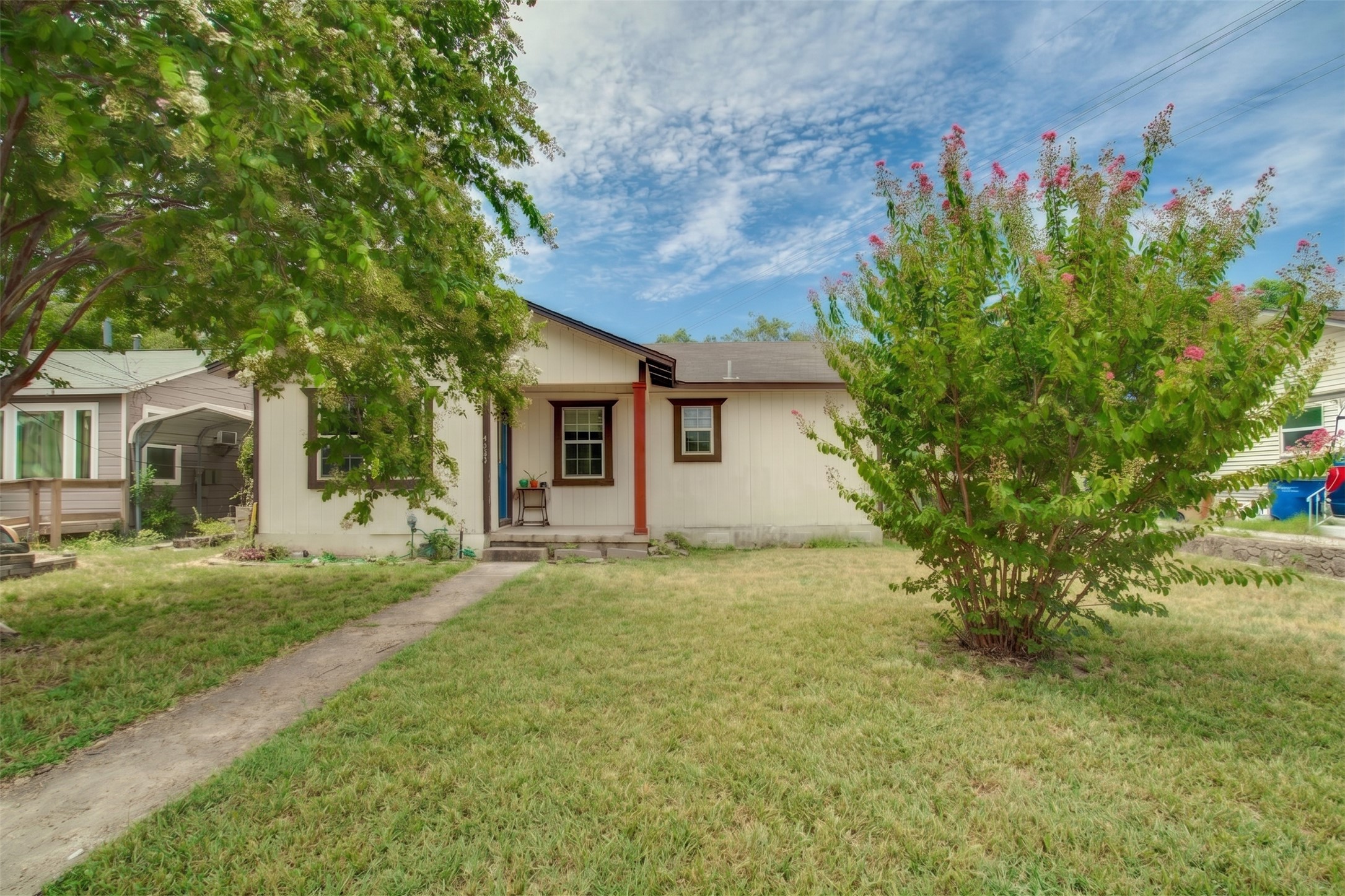 4615 Ribbecke Avenue Austin, TX 78721 - Photo 17 of 19 A classic facade with a welcoming porch and mature landscaping for optimal curb appeal.