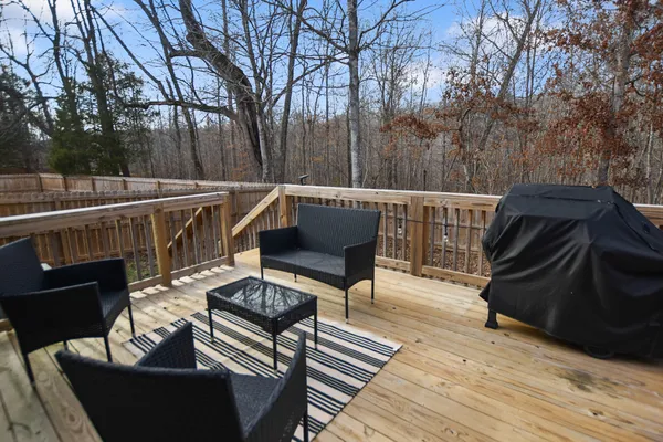 a view of balcony with furniture