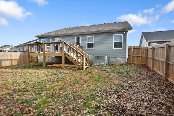 a house view with a backyard space