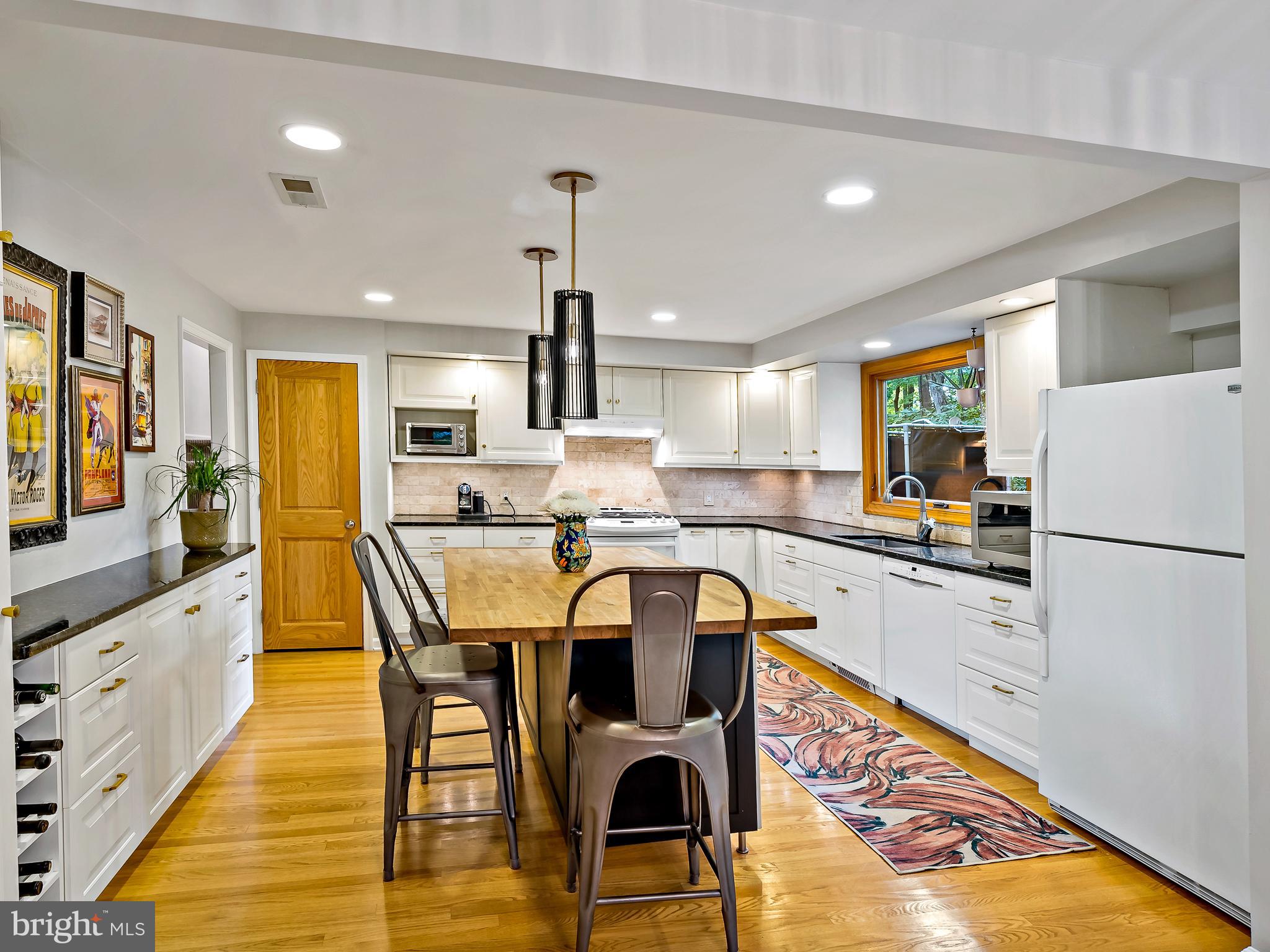315 Danell Road Wayne, PA 19087 - Photo 10 of 34 Large modern kitchen with hardwood floors