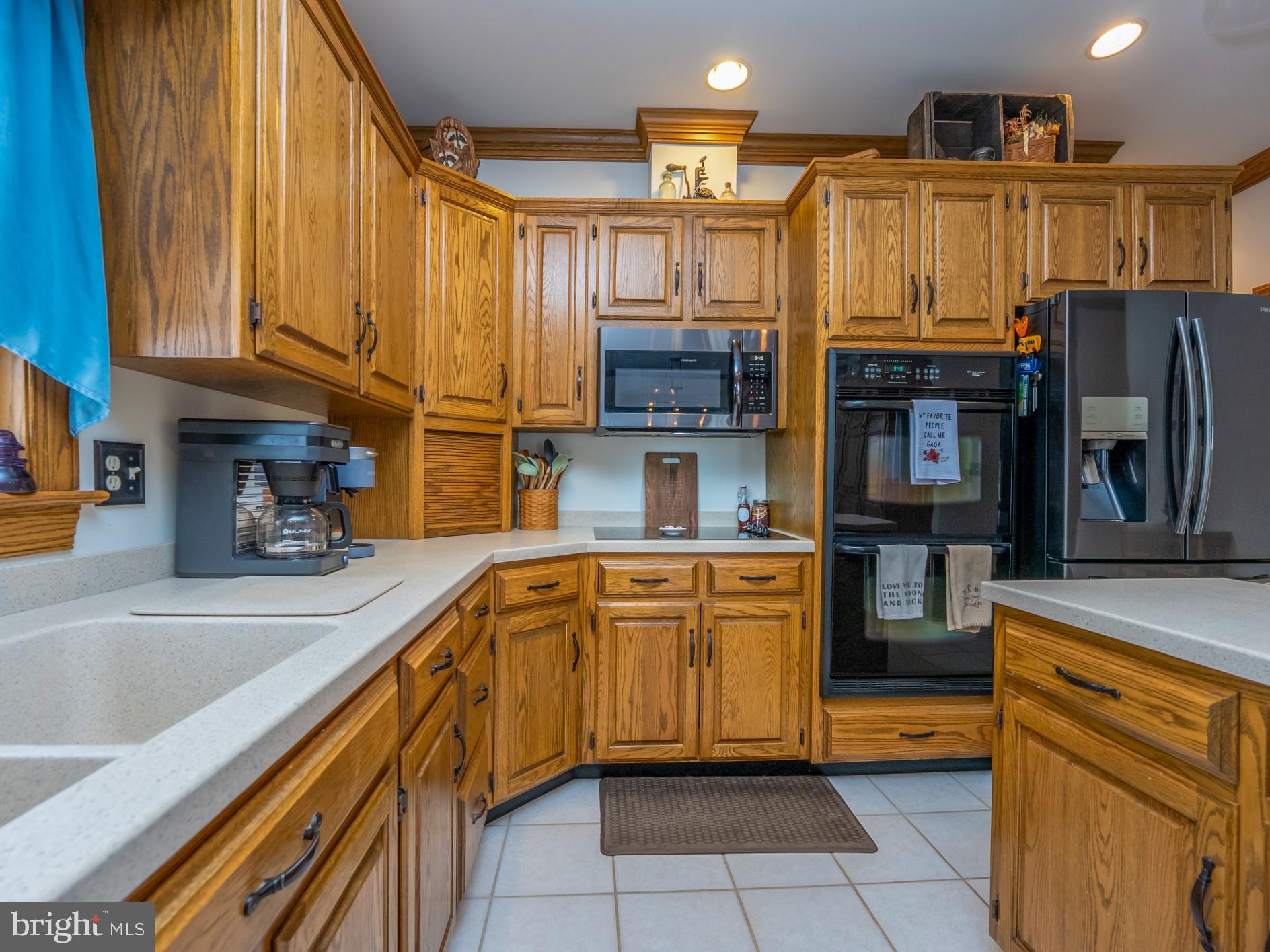 1709 Ragged Edge Road Chambersburg, PA 17202 - Photo 19 of 69 a kitchen with stainless steel appliances granite countertop a sink and cabinets