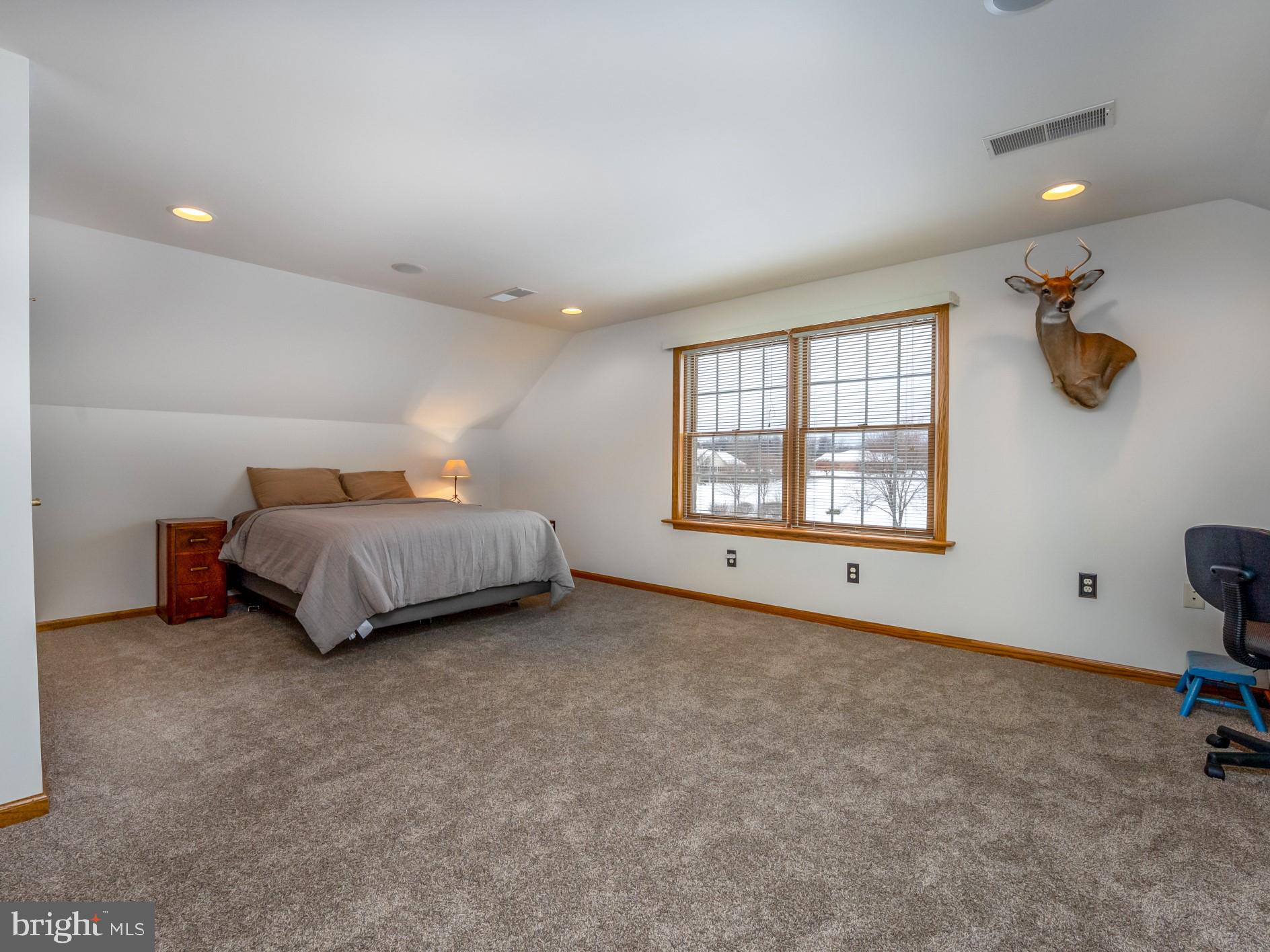 1709 Ragged Edge Road Chambersburg, PA 17202 - Photo 36 of 69 an empty room with windows and cabinet