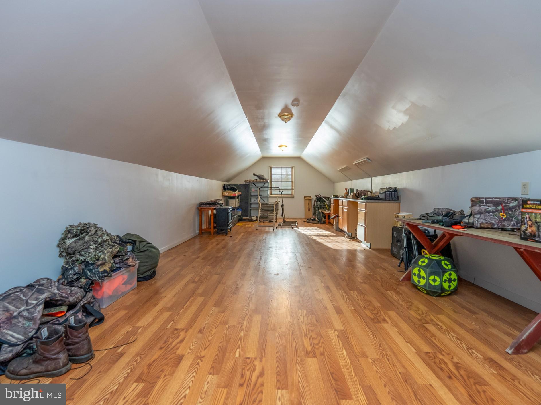 1709 Ragged Edge Road Chambersburg, PA 17202 - Photo 45 of 69 a room with lots of wooden furniture and clutter