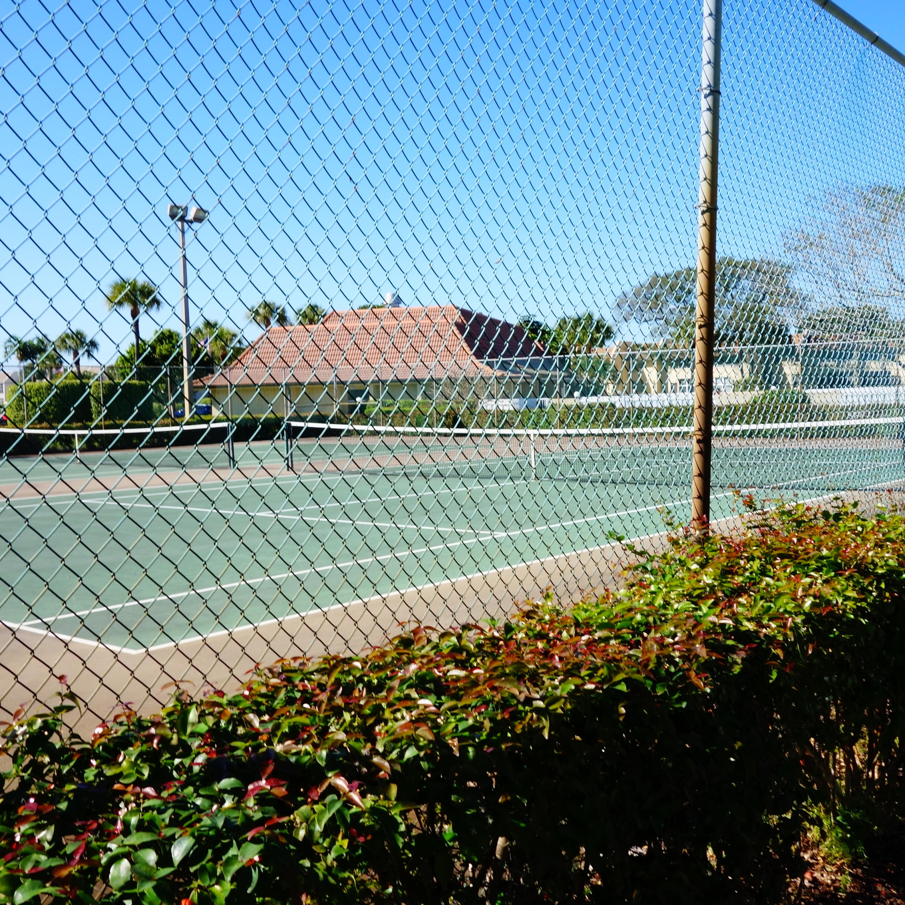 2805 Southwest 22nd Avenue, Unit 2060 Delray Beach, FL 33445 - Photo 10 of 11 a view of a street with a building in the background