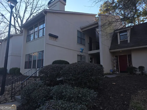 a house view with a outdoor space