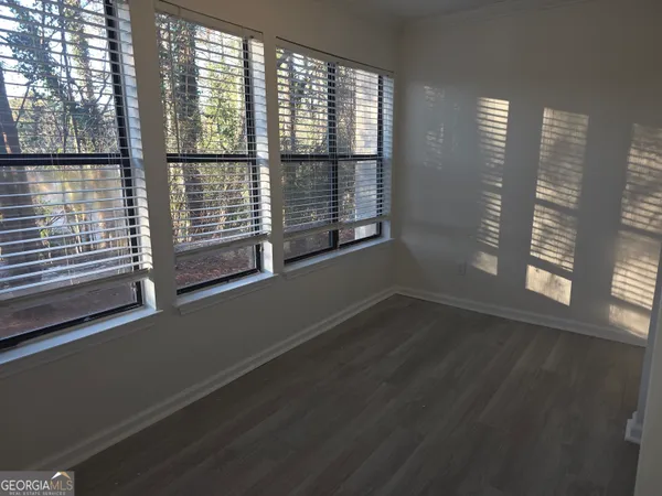 a view of a room with a large window
