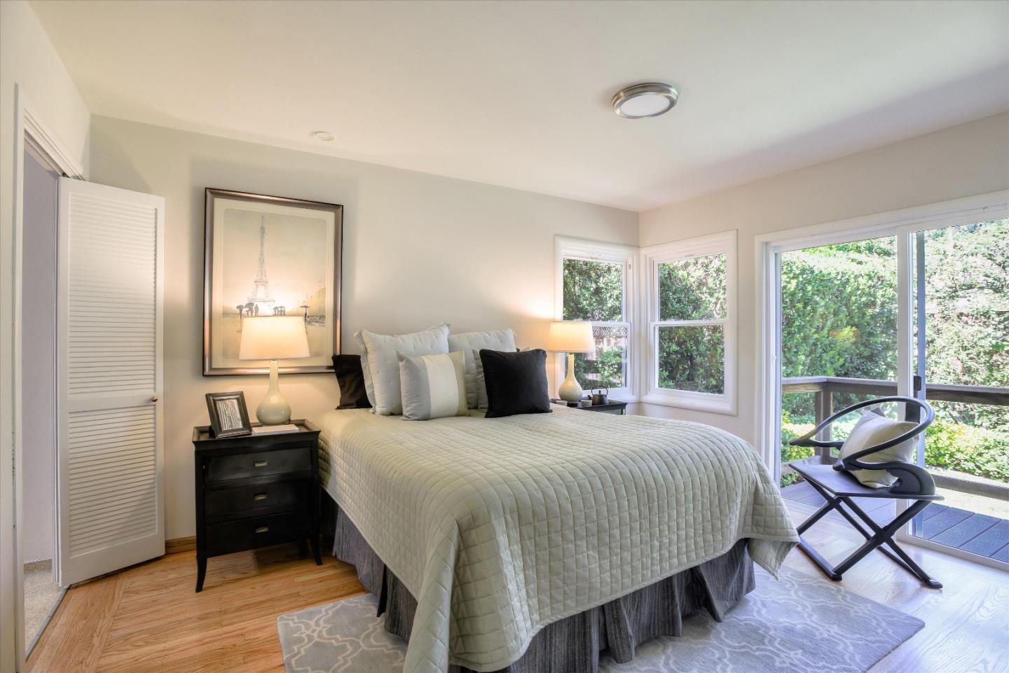 340 Princeton Road Menlo Park, CA 94025 - Photo 14 of 31 a bedroom with a bed and a large window