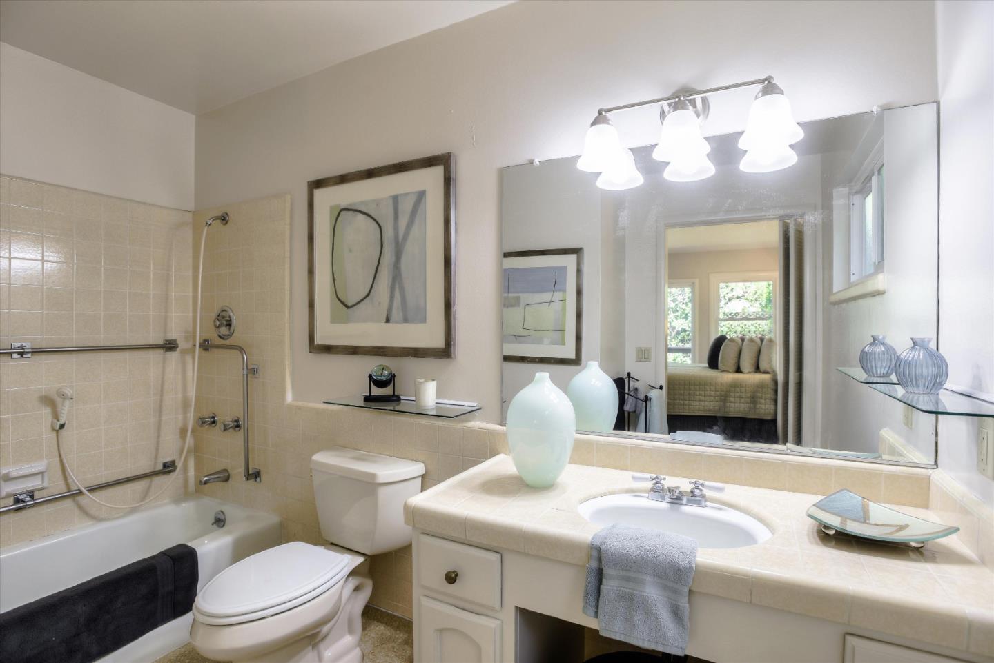 340 Princeton Road Menlo Park, CA 94025 - Photo 17 of 31 a bathroom with a sink a toilet and a mirror