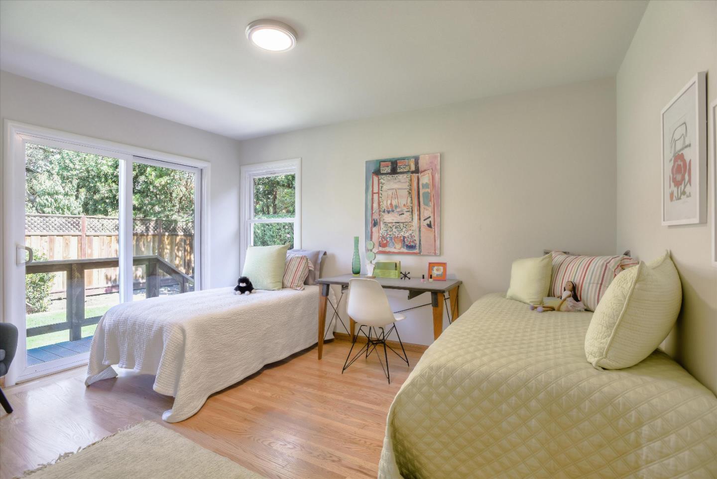 340 Princeton Road Menlo Park, CA 94025 - Photo 18 of 31 a bedroom with two beds and a large window