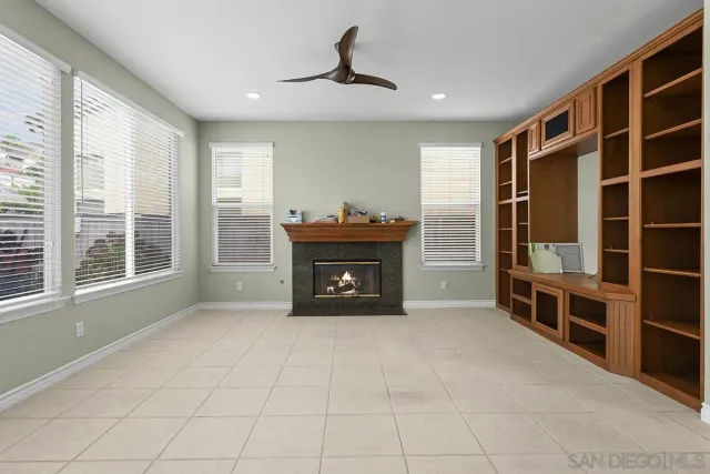 an empty room with wooden floor