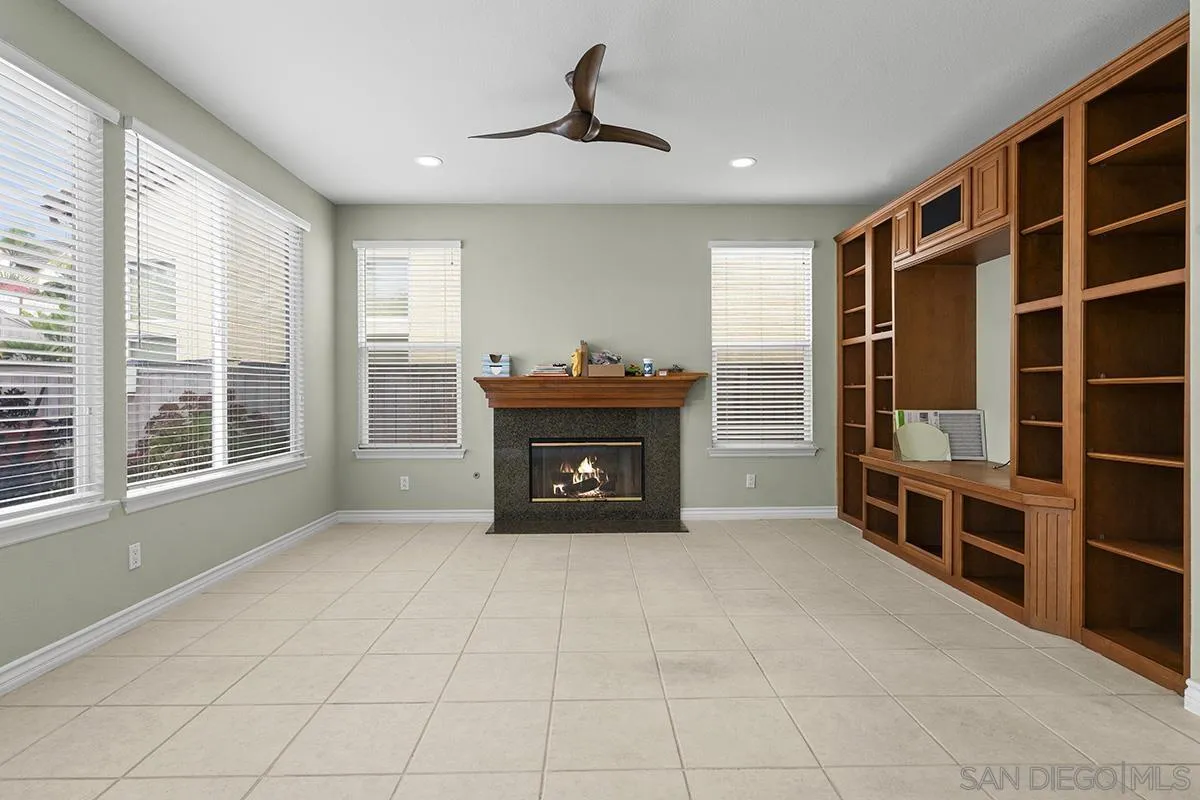 4418 Shorepointe Way San Diego, CA 92130 - Photo 24 of 65 a view of an empty room with furniture and window