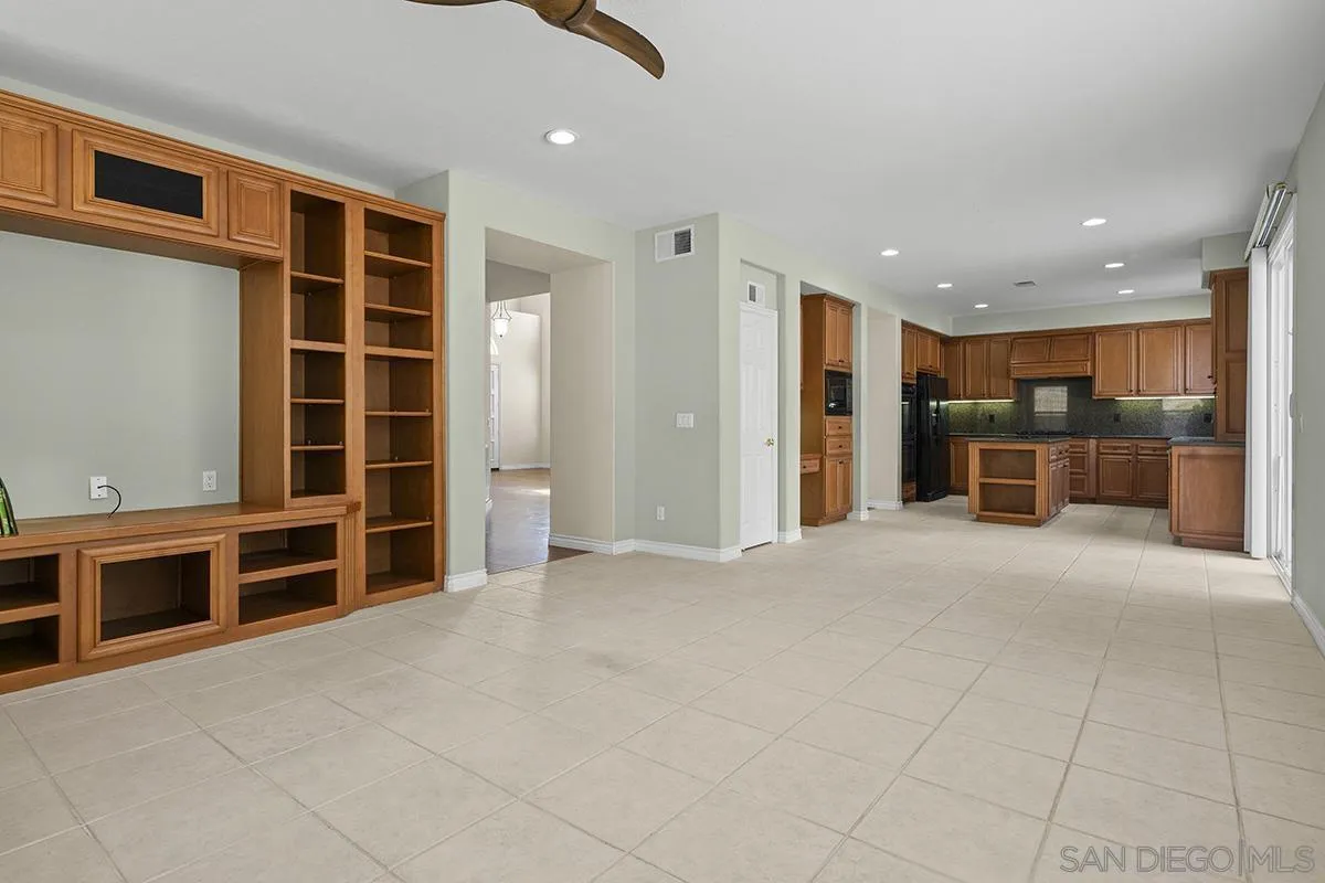 4418 Shorepointe Way San Diego, CA 92130 - Photo 31 of 65 a view of an empty room with furniture and window