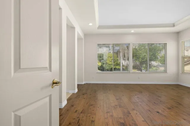 a spacious bathroom with a tub shower and sink