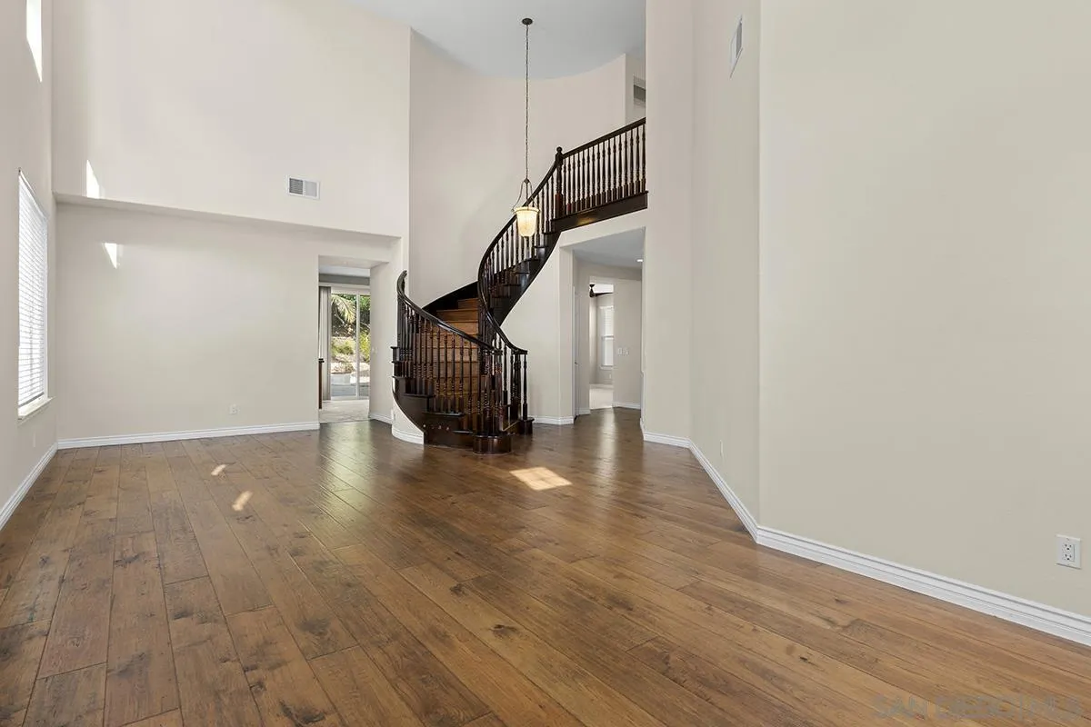 4418 Shorepointe Way San Diego, CA 92130 - Photo 6 of 65 a view of empty room with wooden floor