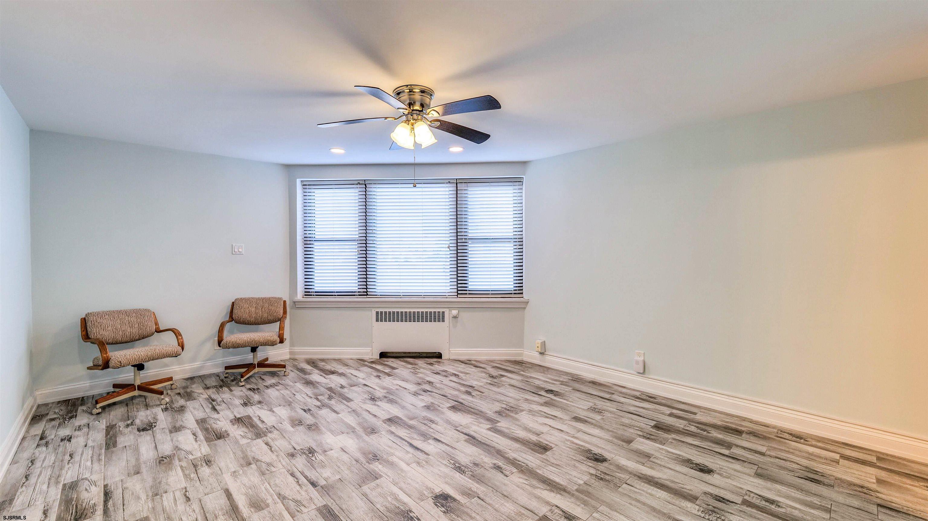 101 South Raleigh Avenue, Unit 226 Atlantic City, NJ 08401 - Photo 11 of 26 a bedroom with a bed and window