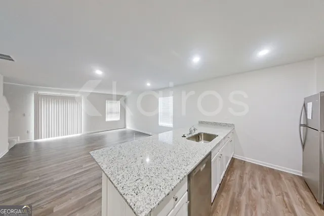 a bathroom with a sink and mirror