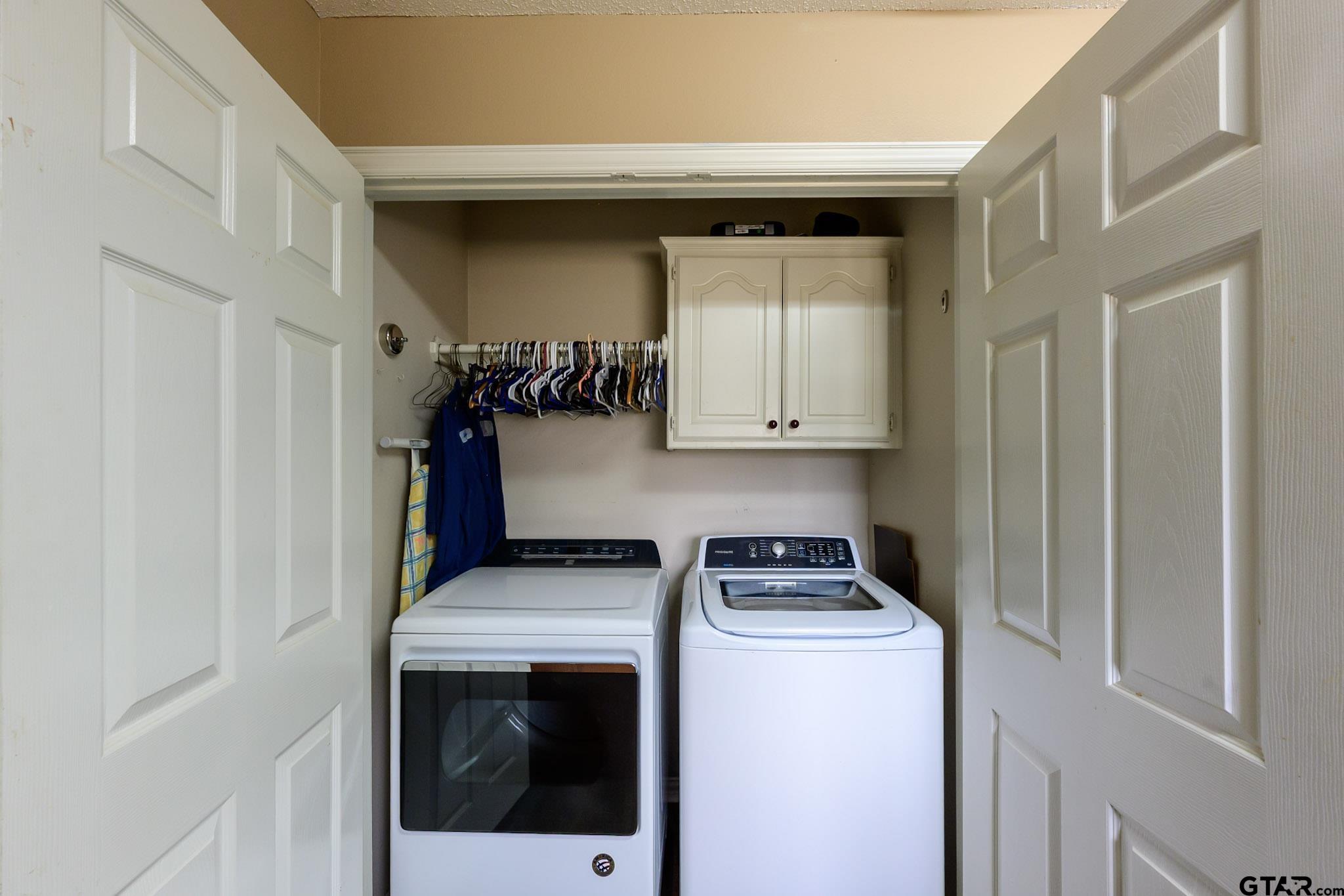 703 Kickapoo Road Chandler, TX 75758 - Photo 23 of 33 a utility room with dryer and washer