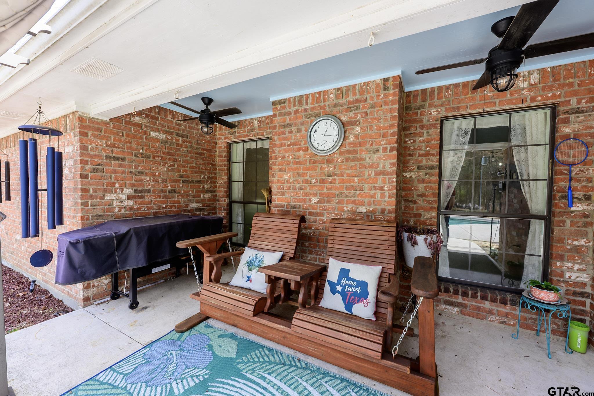703 Kickapoo Road Chandler, TX 75758 - Photo 24 of 33 a view of a patio with a table and chairs
