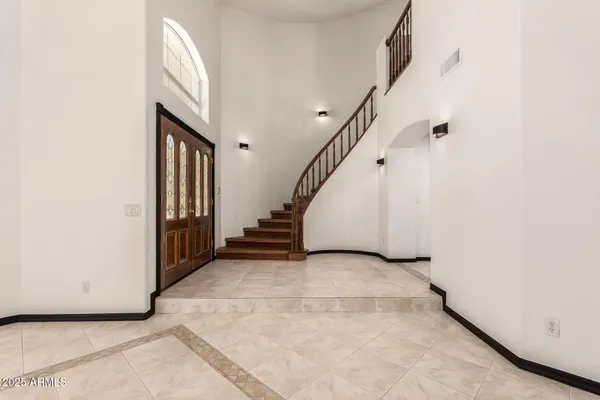 a view of entryway with a front door