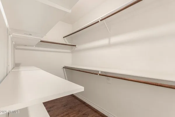 a bathroom with a shower and a toilet