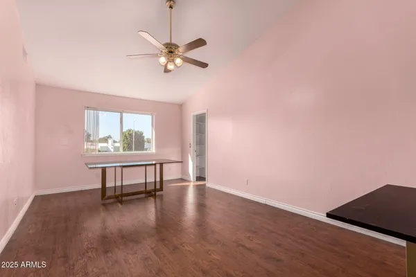 a view of a livingroom with furniture and a garage