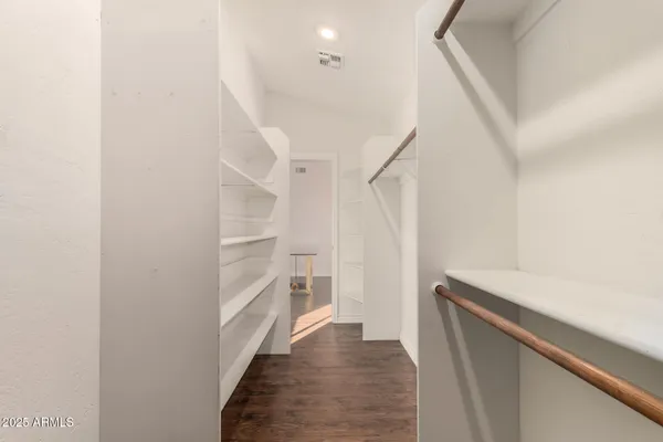 a view of a room with a large window