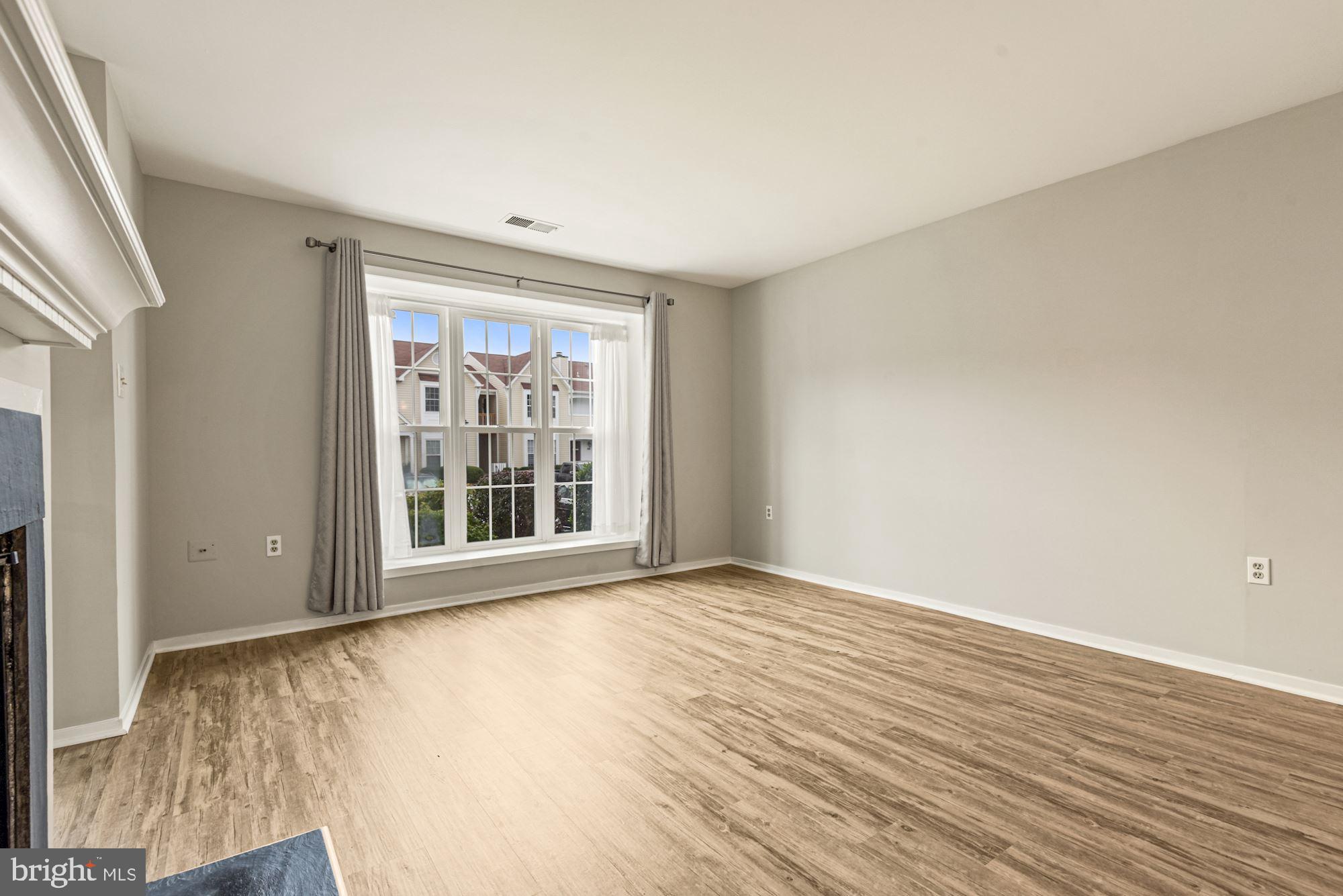 7825 Harrowgate Circle, Unit 142 Springfield, VA 22152 - Photo 12 of 38 Huge Picture Window in Living Room