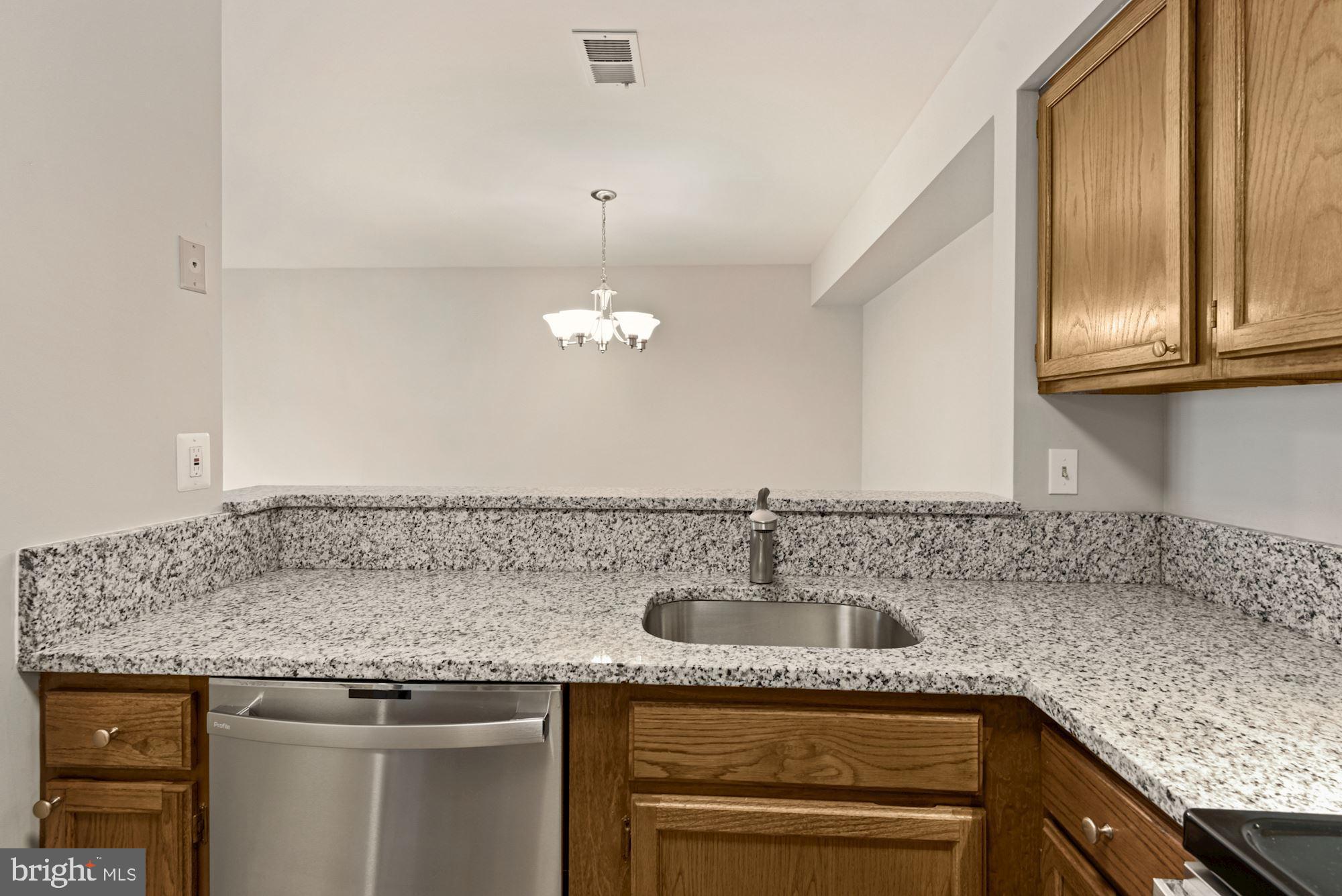 7825 Harrowgate Circle, Unit 142 Springfield, VA 22152 - Photo 16 of 38 New 2021 Granite Countertops & Deep Sink