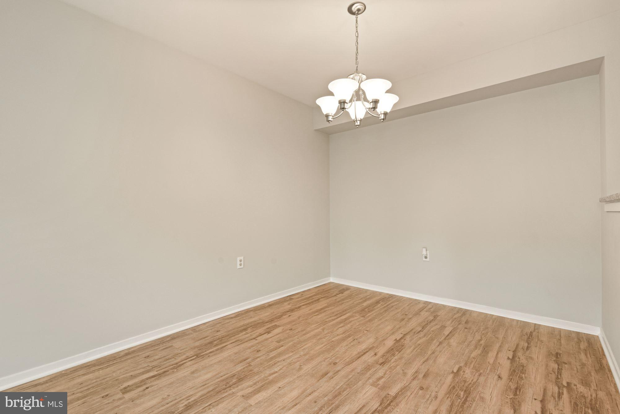 7825 Harrowgate Circle, Unit 142 Springfield, VA 22152 - Photo 23 of 38 Luxury Vinyl Plank Flooring in DR