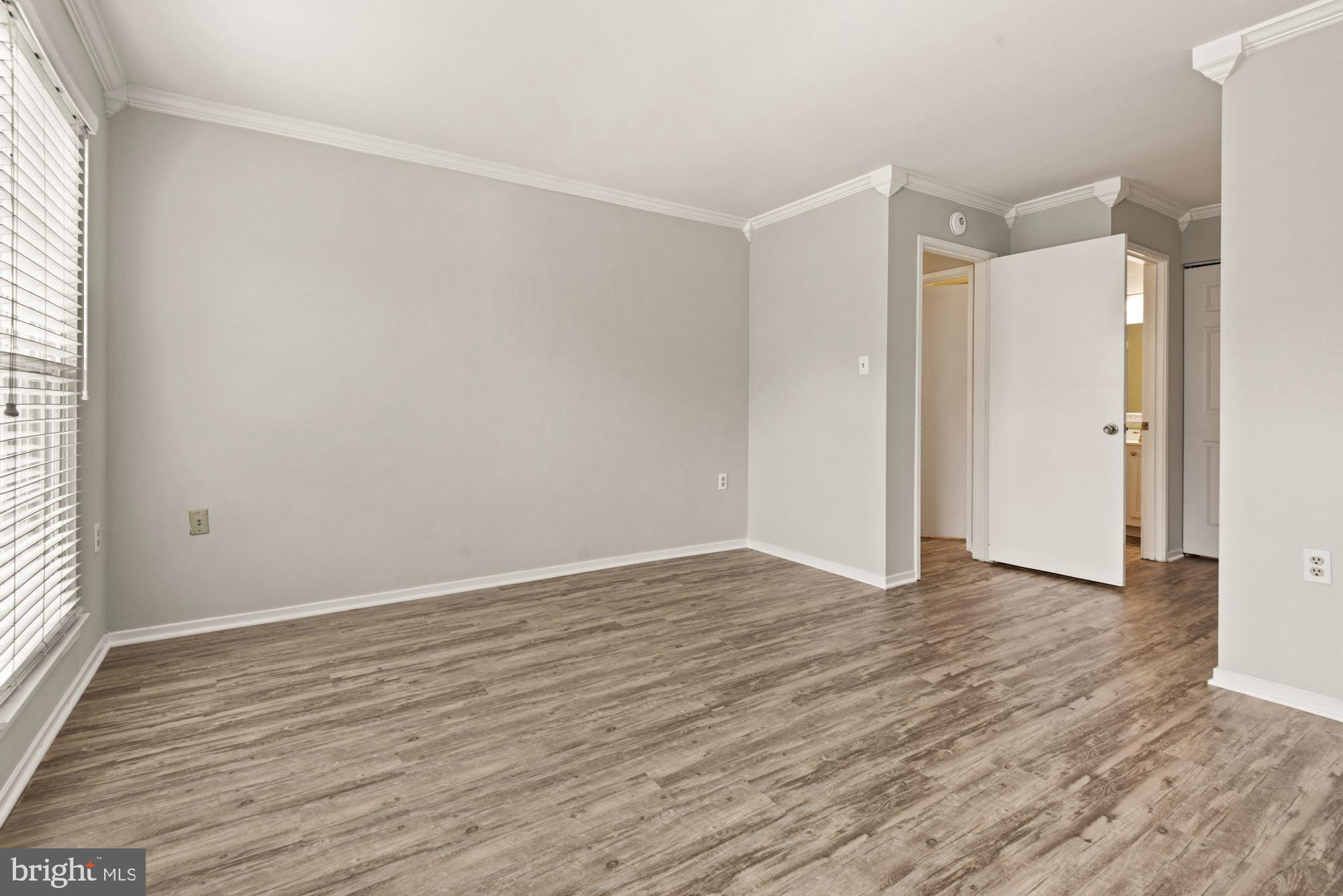 7825 Harrowgate Circle, Unit 142 Springfield, VA 22152 - Photo 27 of 38 Luxury Vinyl Plank Flooring