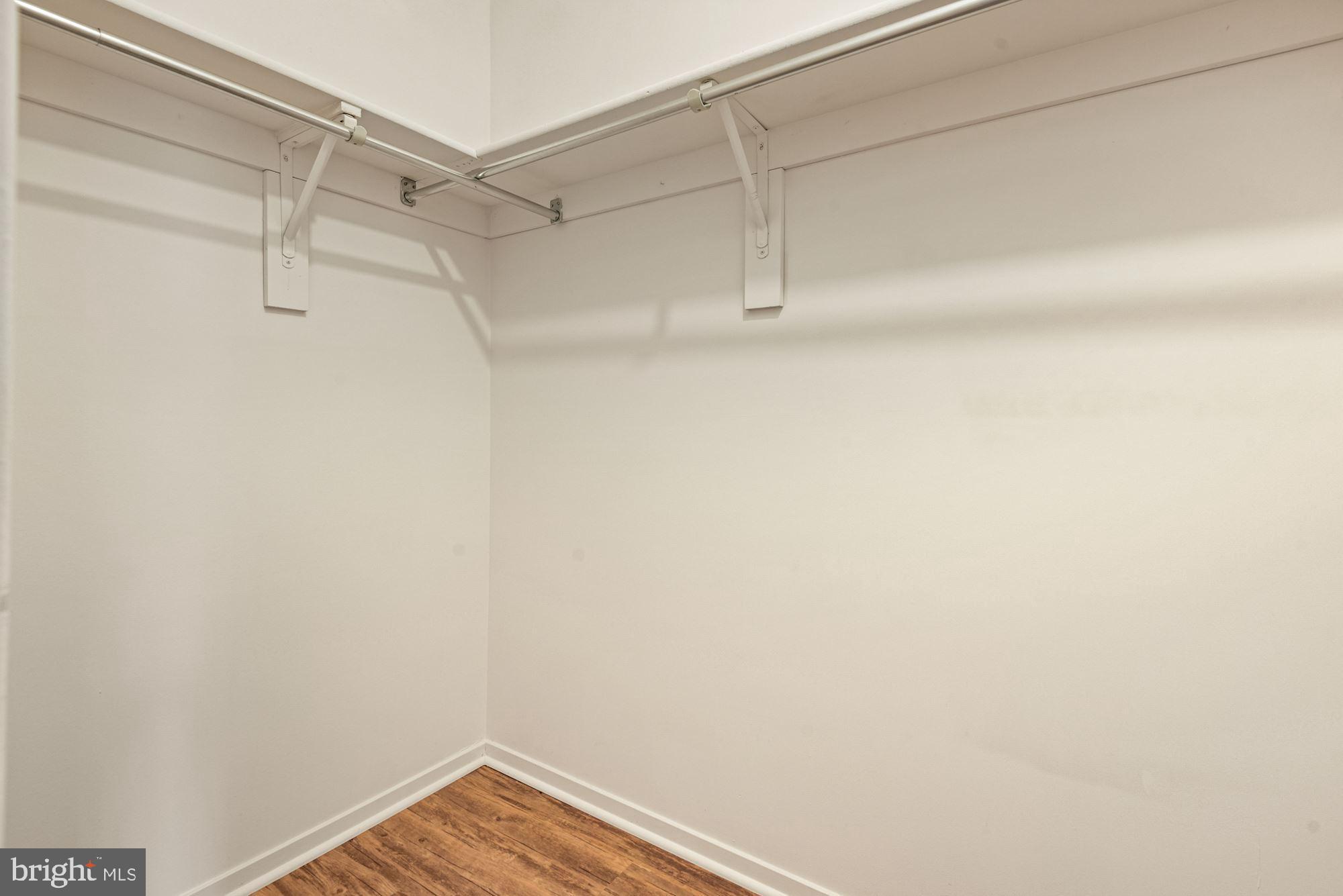 7825 Harrowgate Circle, Unit 142 Springfield, VA 22152 - Photo 29 of 38 Bedroom Walk-in Closet #1
