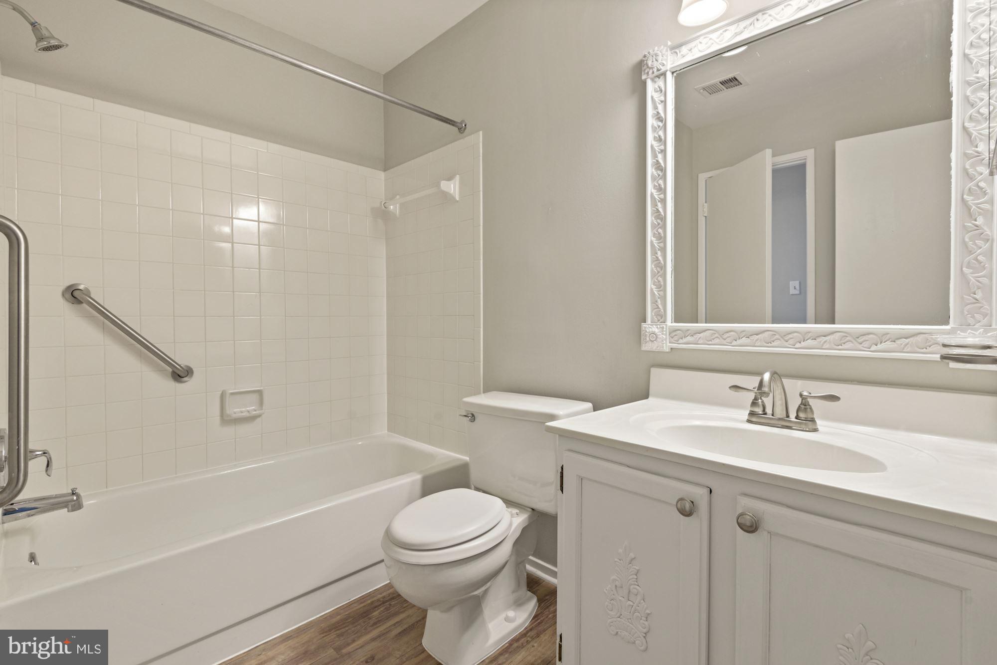 7825 Harrowgate Circle, Unit 142 Springfield, VA 22152 - Photo 32 of 38 Bath Set Up with grab bars