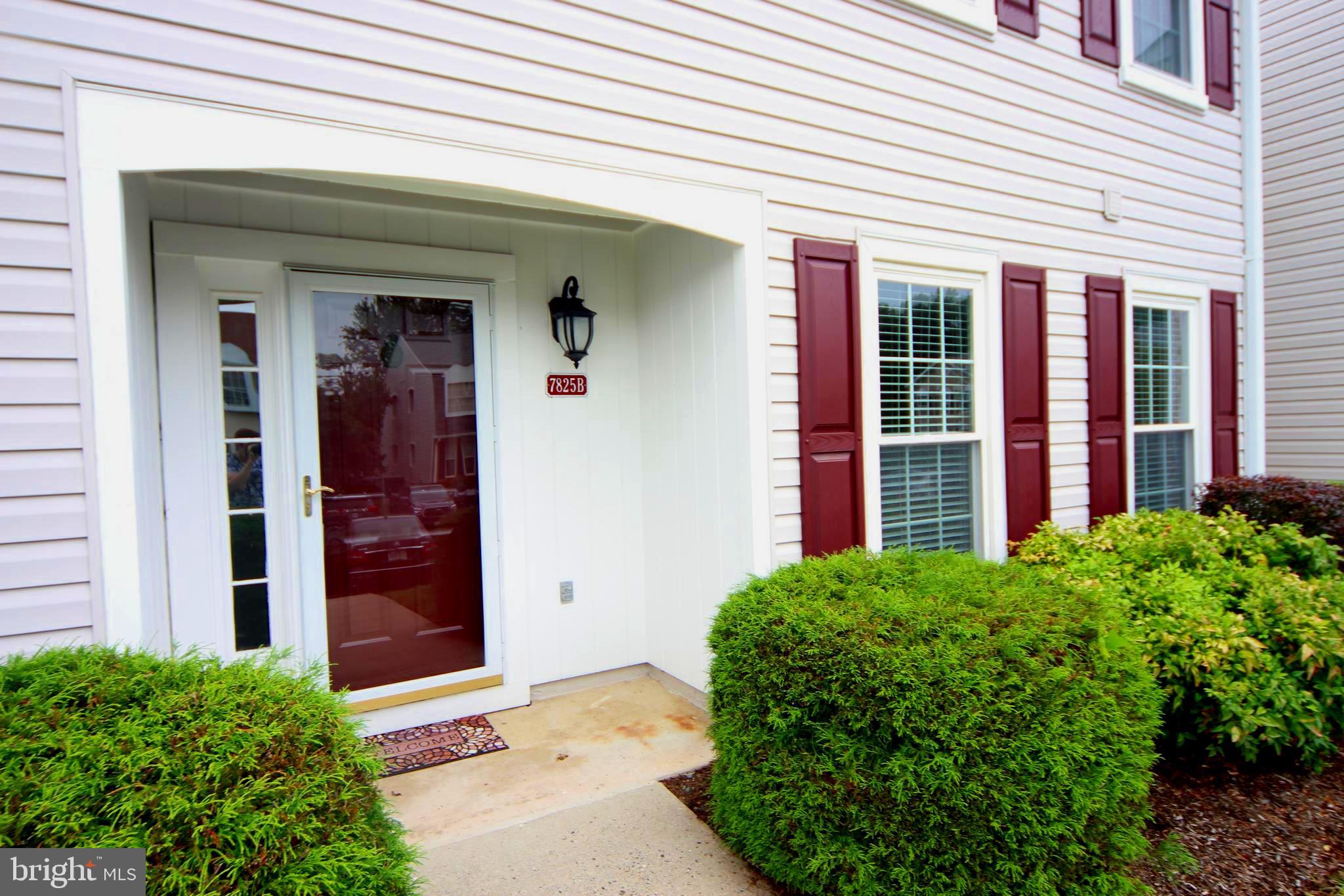 7825 Harrowgate Circle, Unit 142 Springfield, VA 22152 - Photo 5 of 38 Covered Entrance