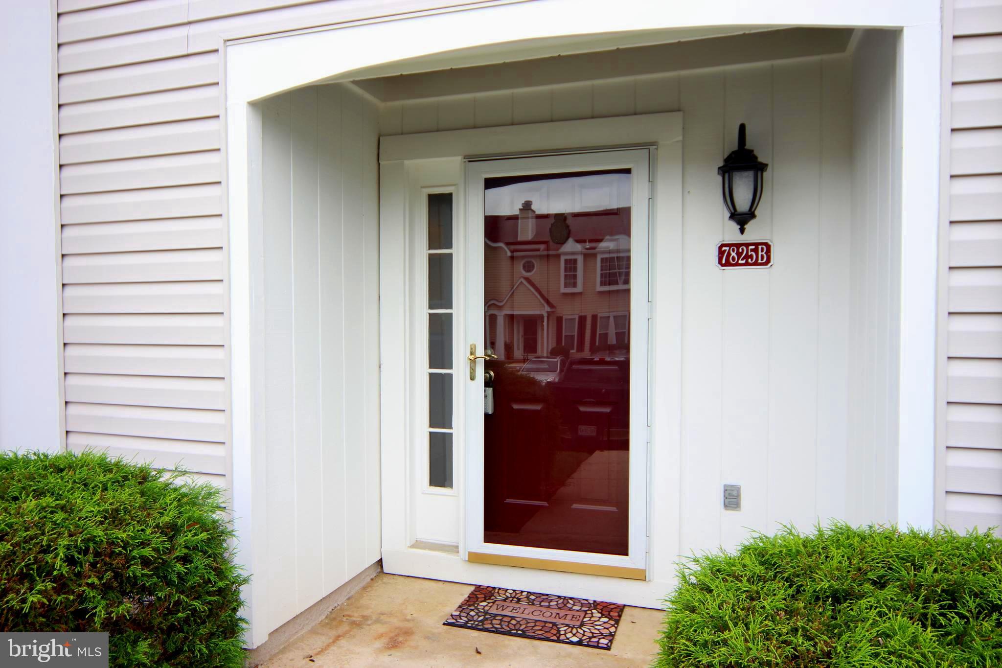 7825 Harrowgate Circle, Unit 142 Springfield, VA 22152 - Photo 6 of 38 Covered Entrance