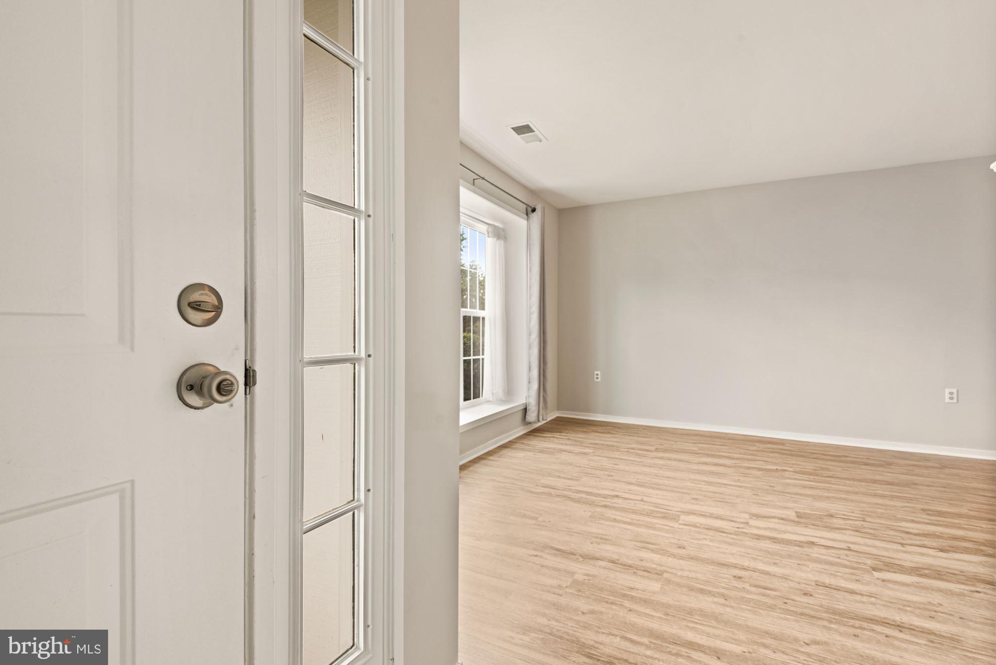 7825 Harrowgate Circle, Unit 142 Springfield, VA 22152 - Photo 7 of 38 Foyer Entry