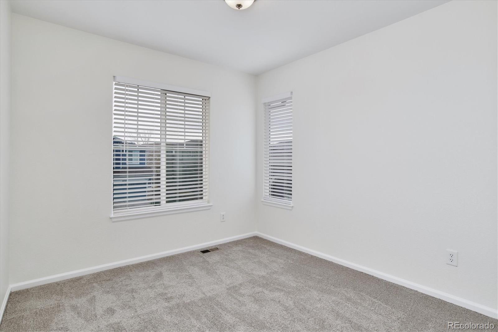 10781 Towerbridge Circle Highlands Ranch, CO 80130 - Photo 25 of 30 a view of an empty room with a window