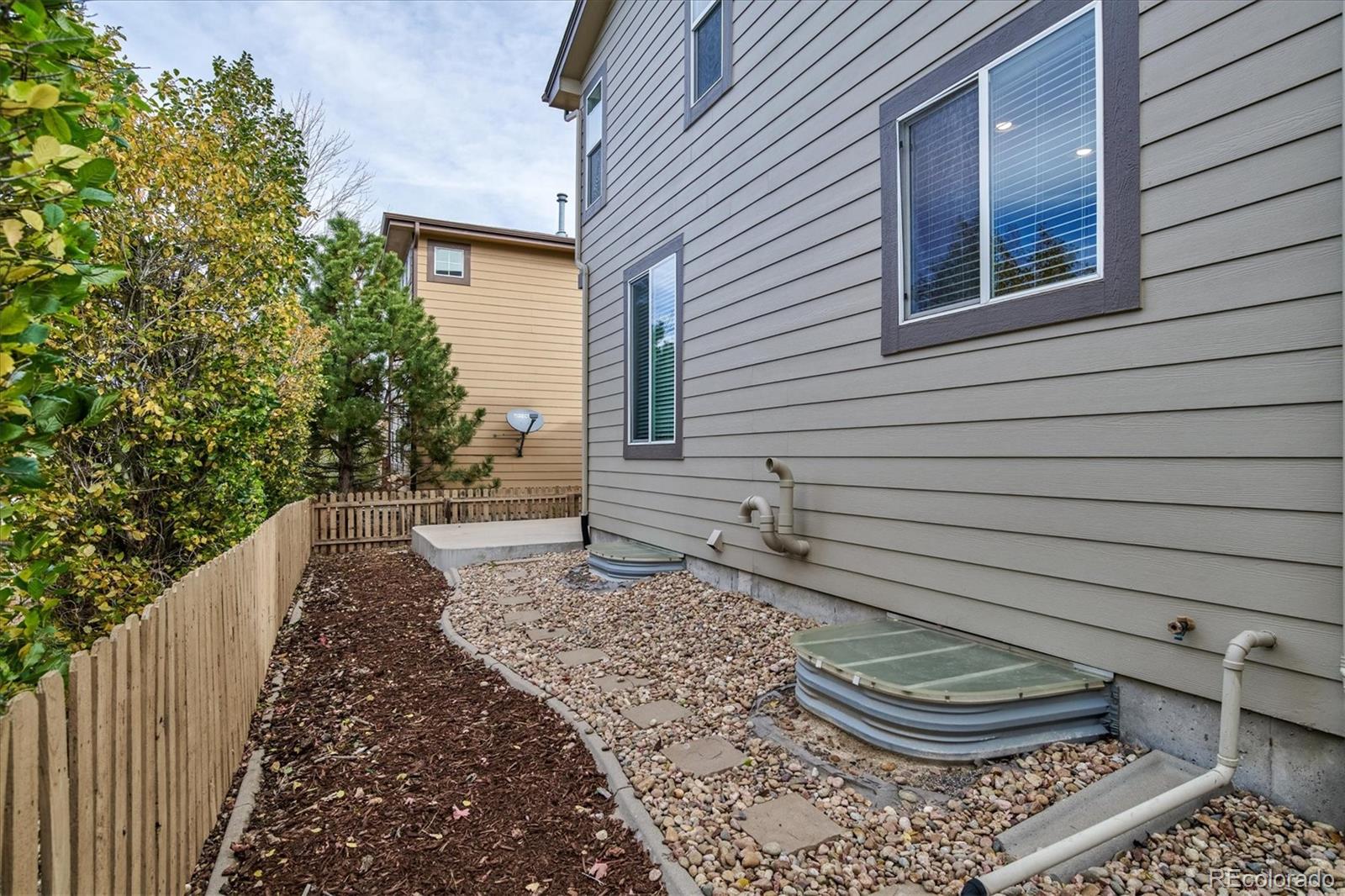 10781 Towerbridge Circle Highlands Ranch, CO 80130 - Photo 30 of 30 a house view with a outdoor space