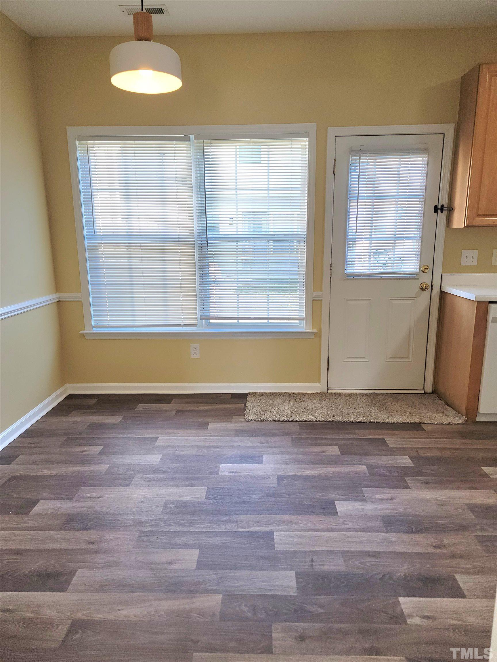 209 Dairy Road Clayton, NC 27520 - Photo 15 of 34 a view of a room that has a window in it