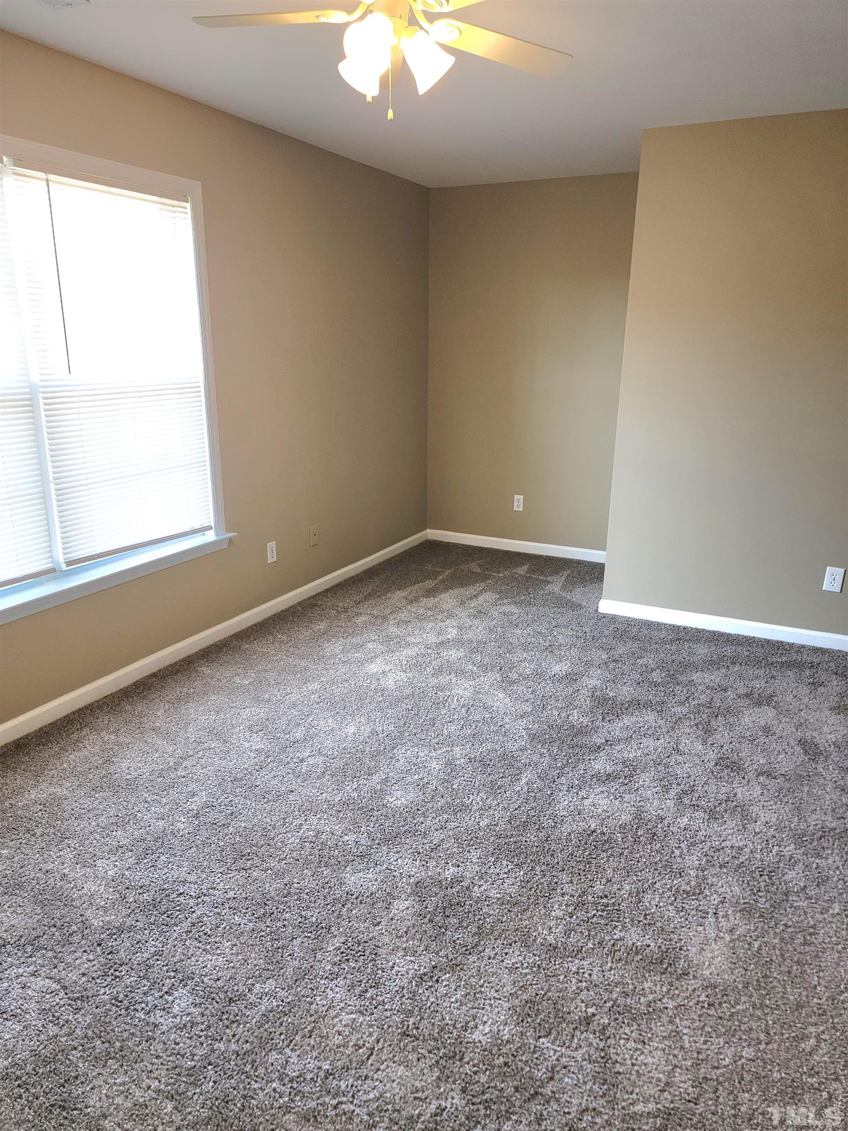 209 Dairy Road Clayton, NC 27520 - Photo 22 of 34 an empty room with a window