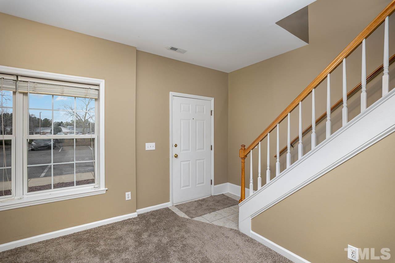 209 Dairy Road Clayton, NC 27520 - Photo 9 of 34 a view of an entryway with workspace