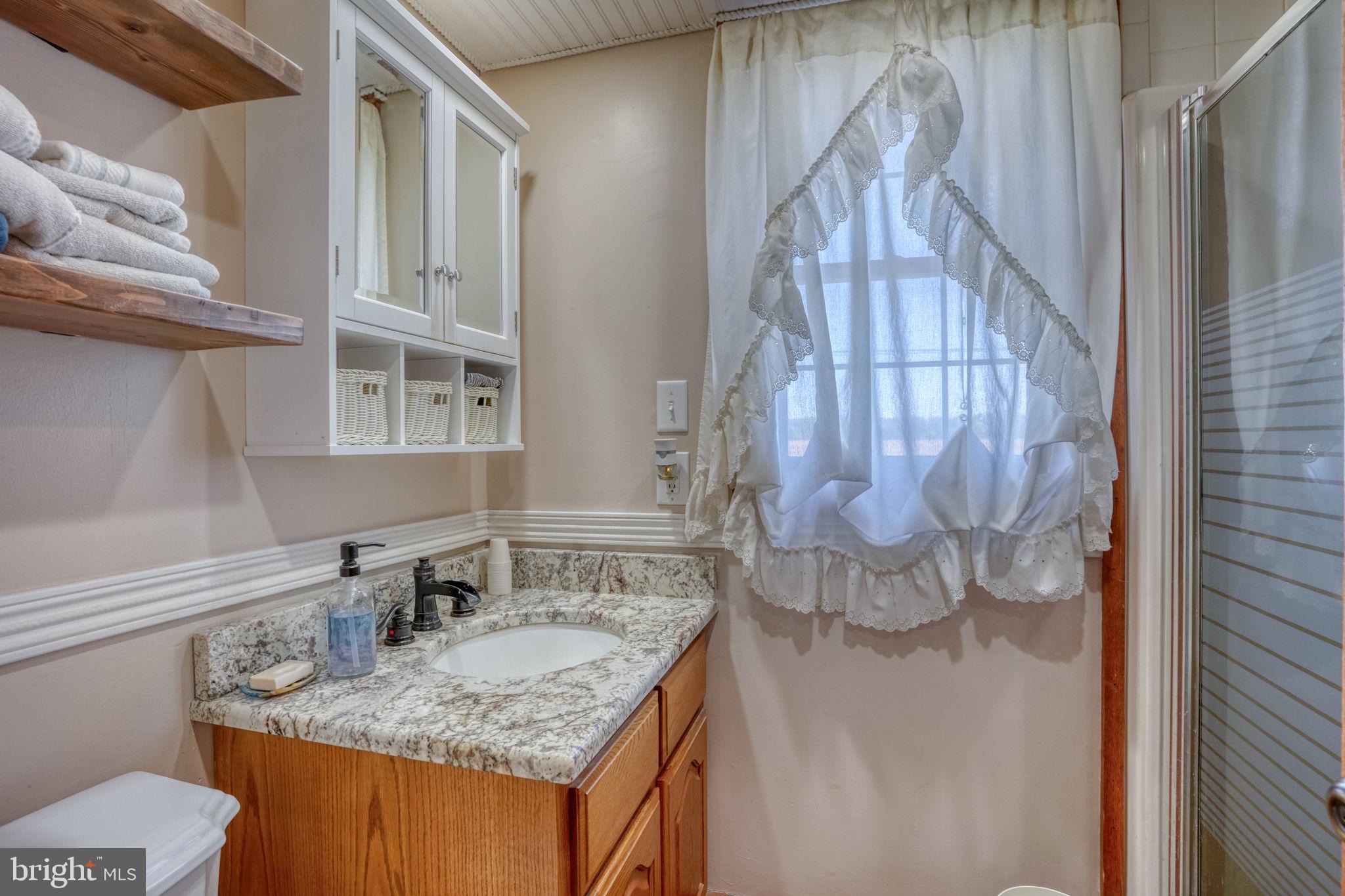 707 Blackiston Road Clayton, DE 19938 - Photo 24 of 50 Main Floor Bathroom