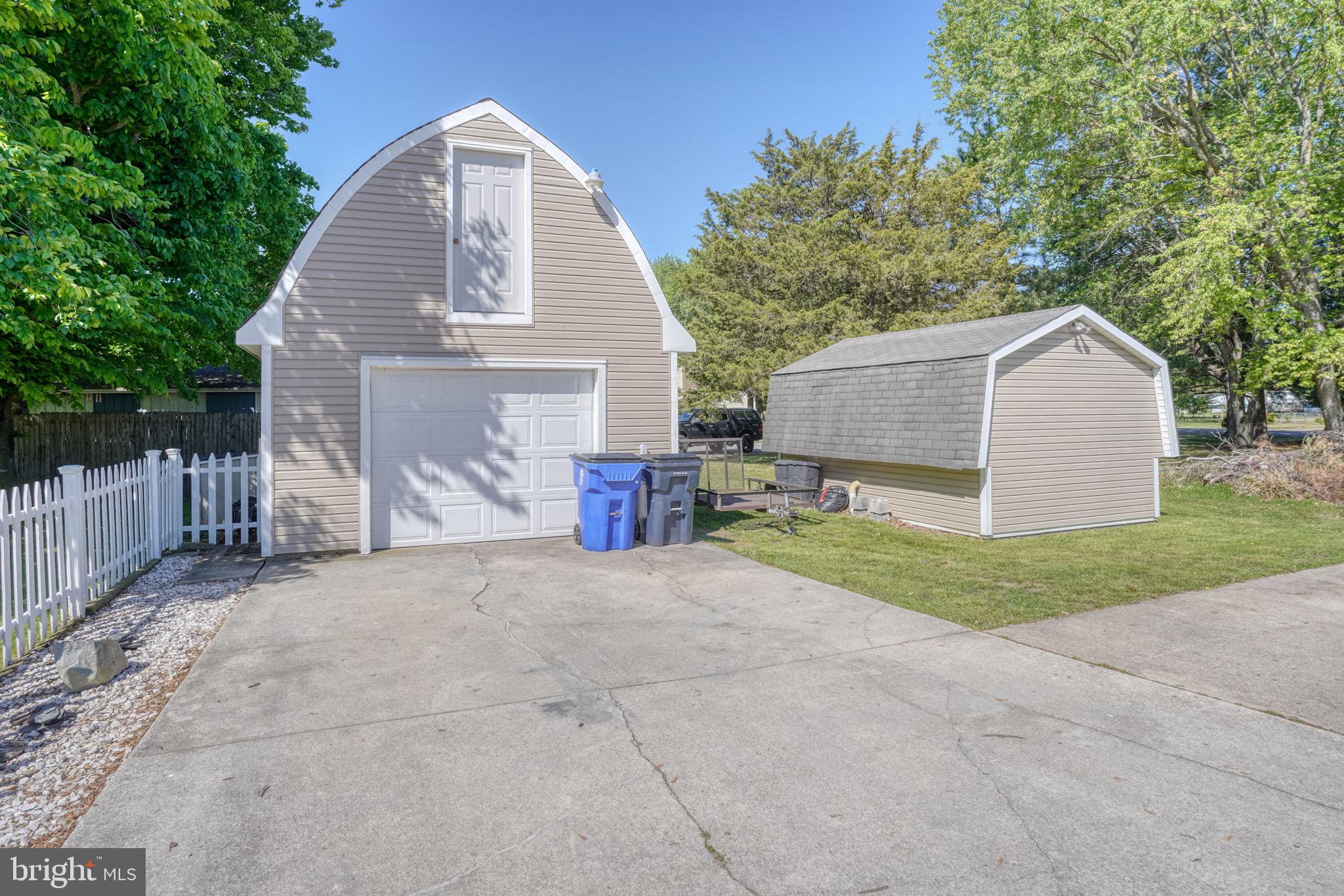 707 Blackiston Road Clayton, DE 19938 - Photo 7 of 50 Detached Garage with upstairs storage and shed.