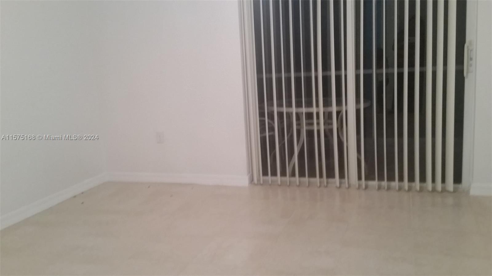 6894 West Sample Road, Unit 6894 Coral Springs, FL 33067 - Photo 14 of 18 a view of a black and white wall